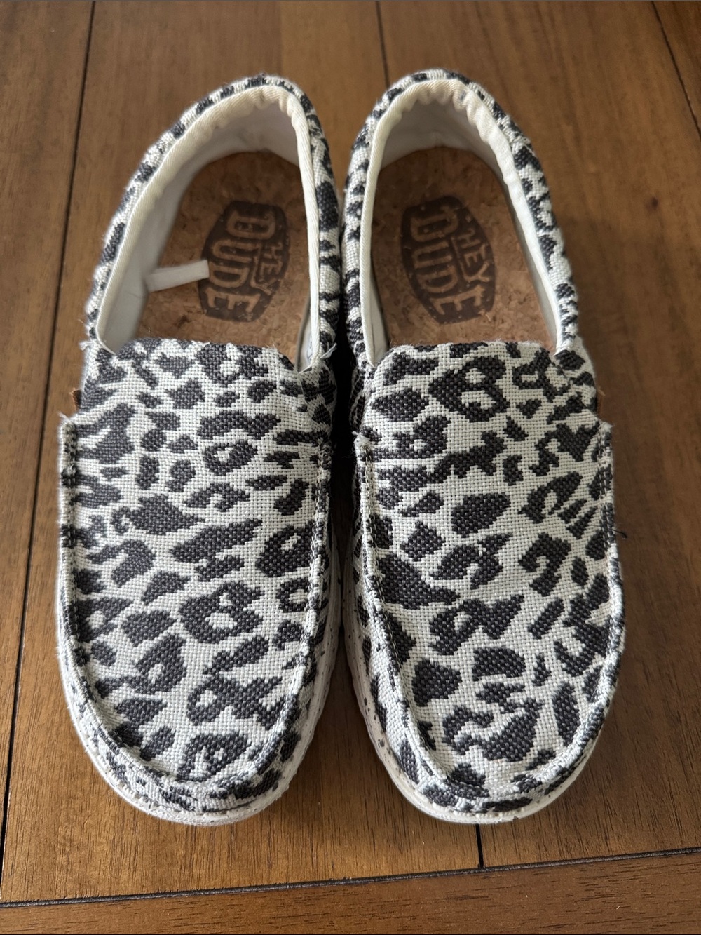 Hey Dude Women’s Slip-On Shoes in Black and Cream Leopard Print